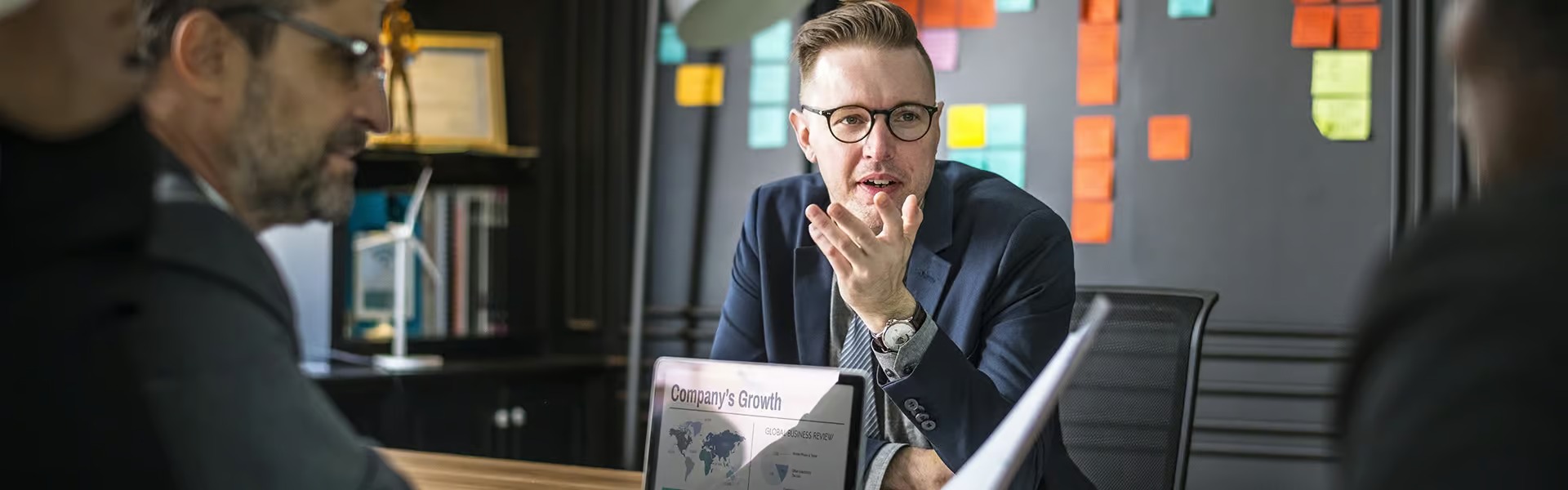 Professionals discussing business growth